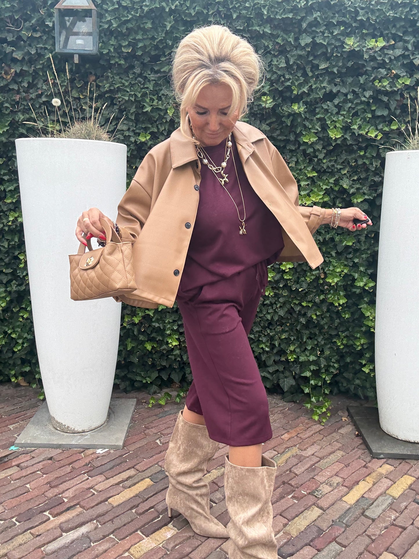 Product titel puh Leatherlook Camel Cape jasje
