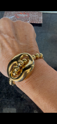 Chuck-armband i guld, justerbart