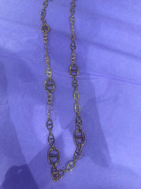 Cadena de oro con eslabones estilo Cucci.