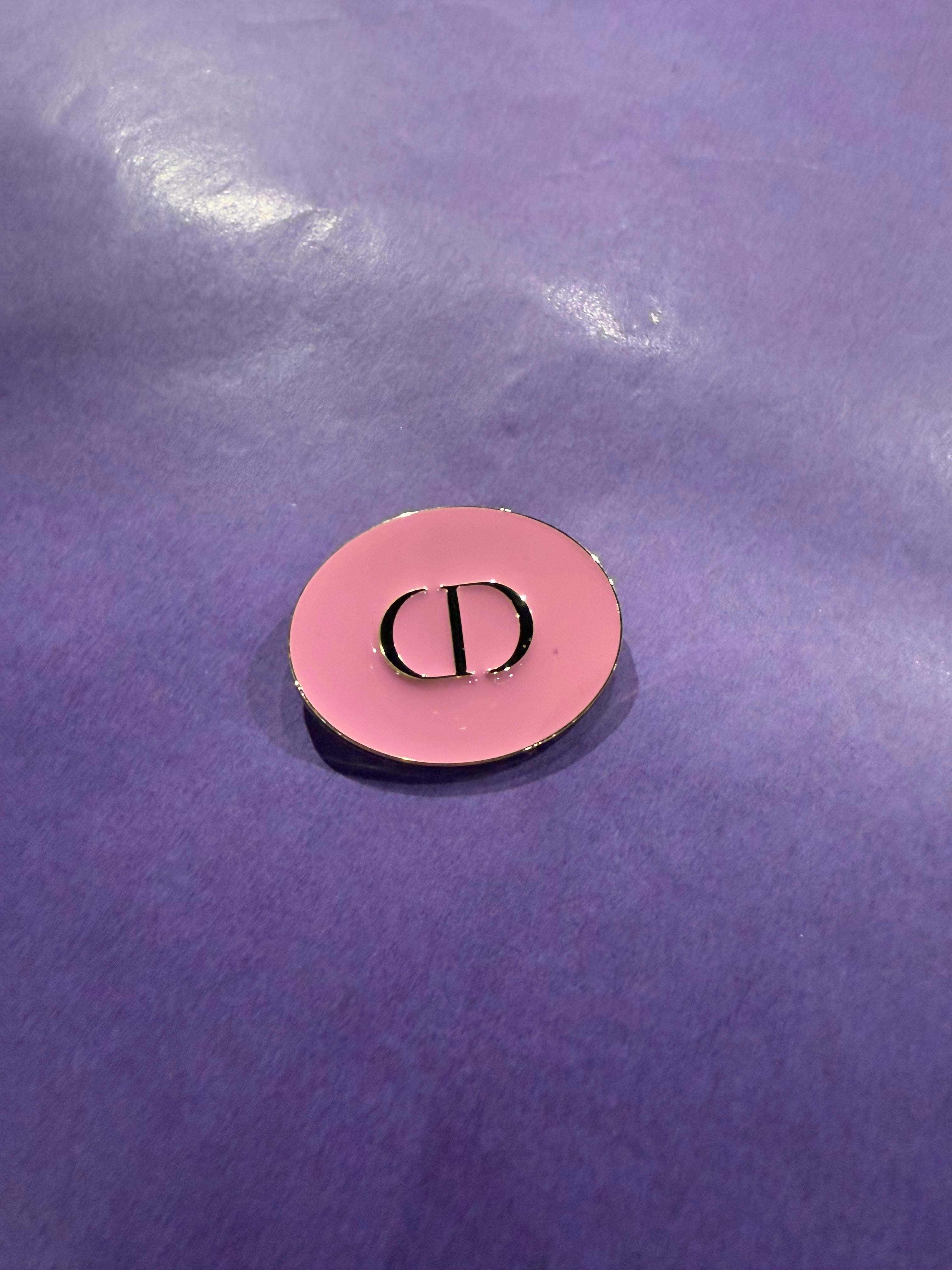 Broche roze CD