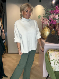 Knoop truitje beige ( wol wit)